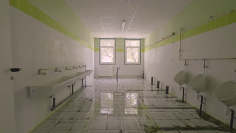 Public-school-toilets-in-construction-zoom-out-slow-motion.-Montpellier